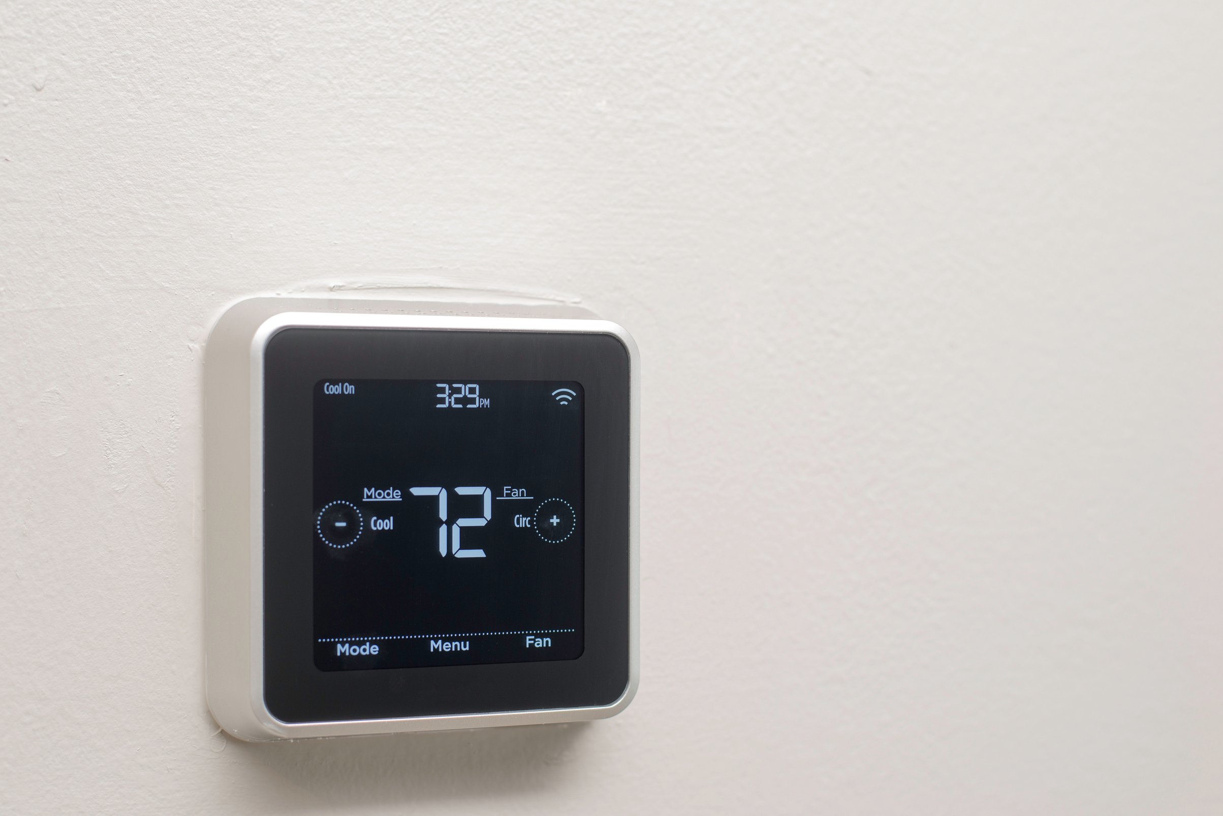 Smart Thermostat on White Wall